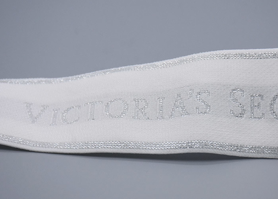 Odzież Dostosowana biała taśma żakardowa 35 mm z błyszczącym srebrnym logo