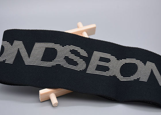 Dwustronne, 100% bawełniane gumki z nadrukowanym silikonowym logo do odzieży