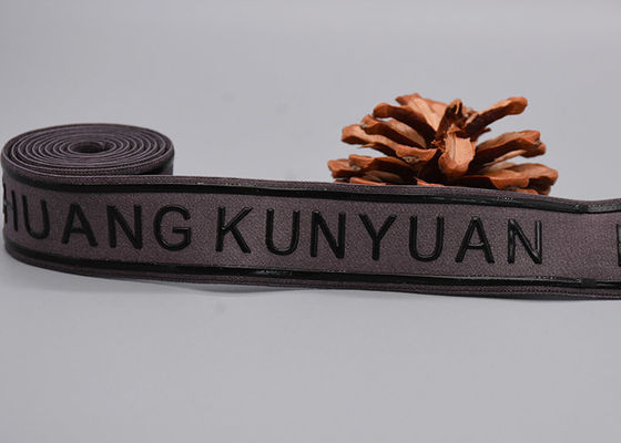 Odzież używa antypoślizgowej gumki z niestandardowym nadrukowanym błyszczącym silikonowym logo